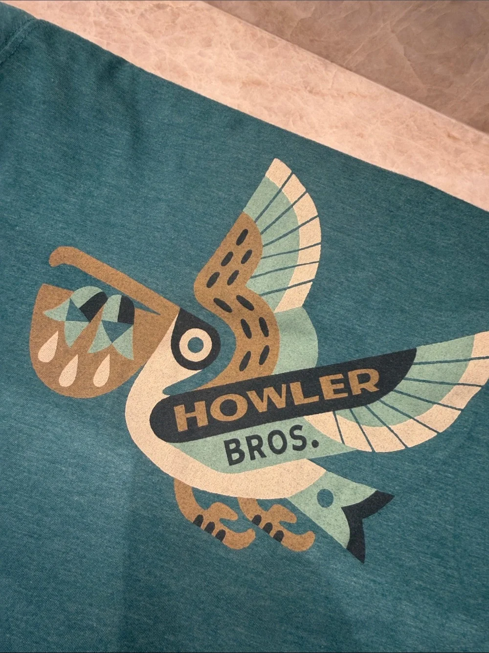 Howler Brothers Teal Throw with Multicolor Pelican Graphic